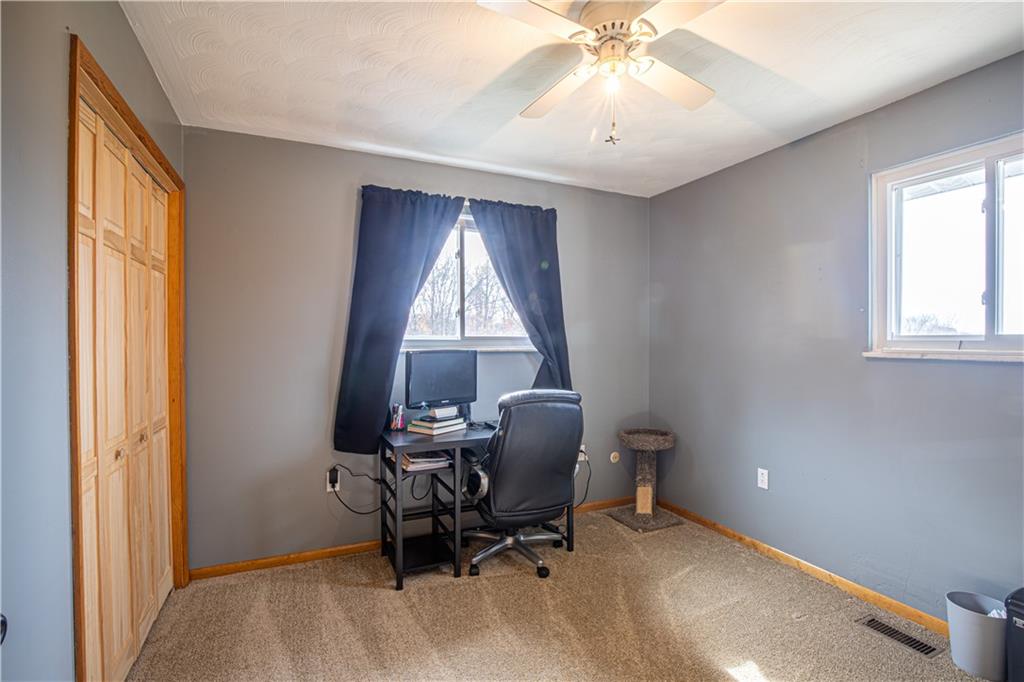 178 Kaider Road Uniontown, PA 15401 - Photo 12 of 17 a workspace with chandelier and window