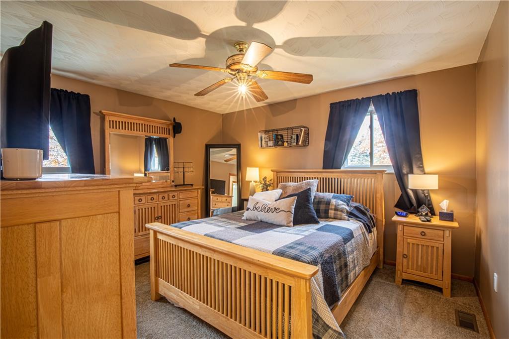 178 Kaider Road Uniontown, PA 15401 - Photo 13 of 17 a bedroom with a bed and a chandelier