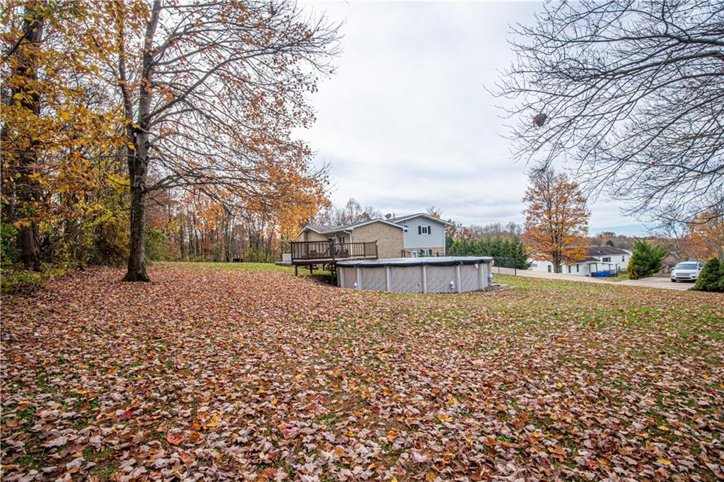 178 Kaider Road Uniontown, PA 15401 - Photo 4 of 17 a view of a house with a yard