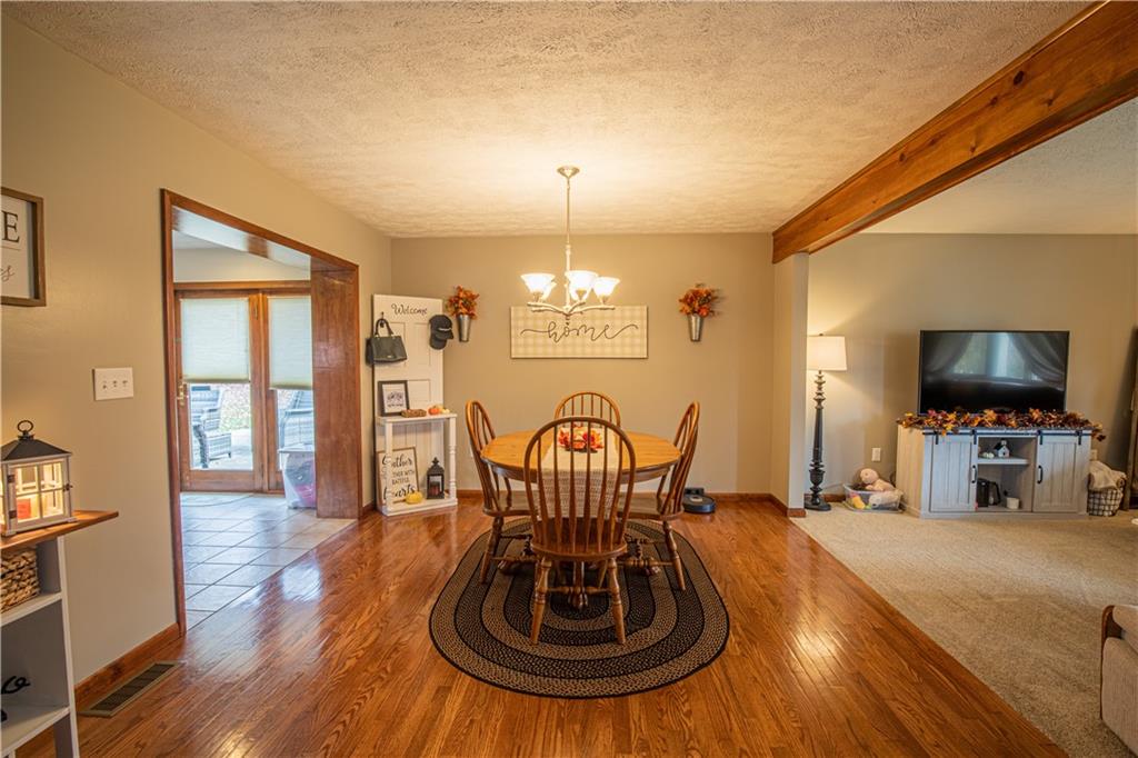 178 Kaider Road Uniontown, PA 15401 - Photo 7 of 17 a view of a livingroom with furniture window and wooden floor