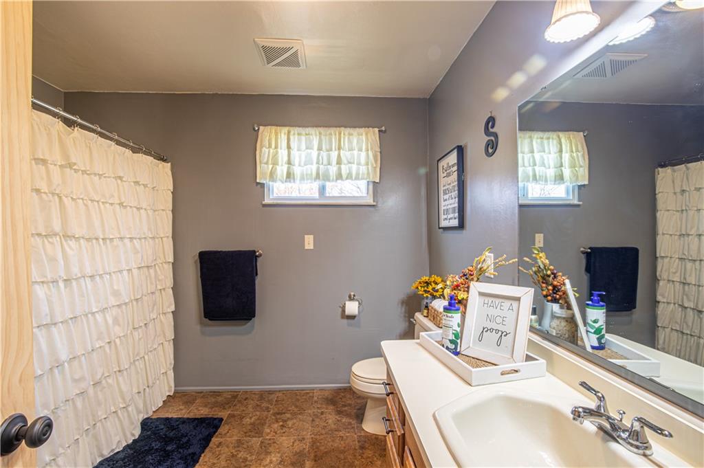 178 Kaider Road Uniontown, PA 15401 - Photo 10 of 17 a bathroom with a sink toilet and mirror