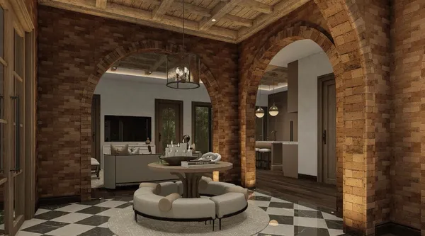 a lobby with furniture and a fireplace