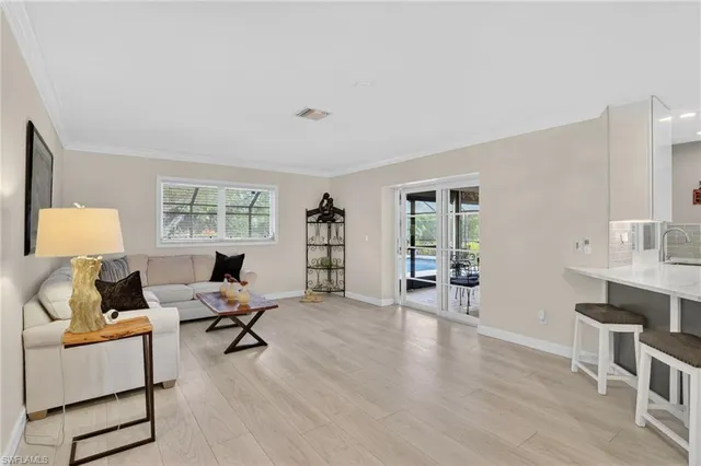 a workspace with furniture hardwood and a window