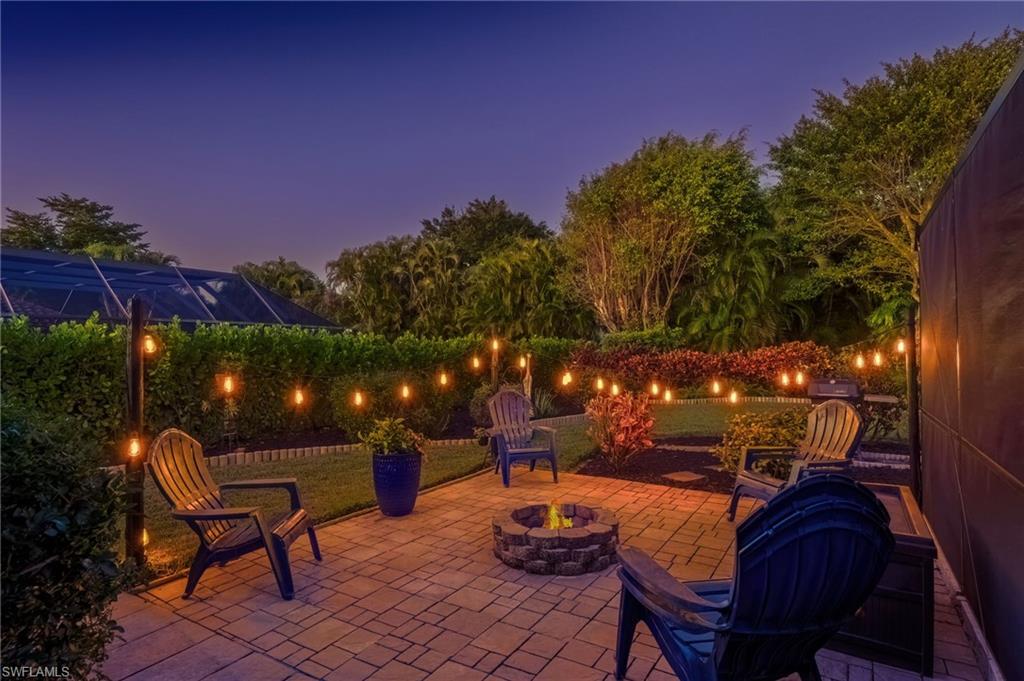 2236 Queens Boulevard Naples, FL 34112 - Photo 2 of 34 a outdoor space with chairs