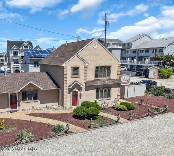 2 A Holiday Road Seaside Heights, NJ 08751 - Photo 40 of 50 a front view of a house with a garden