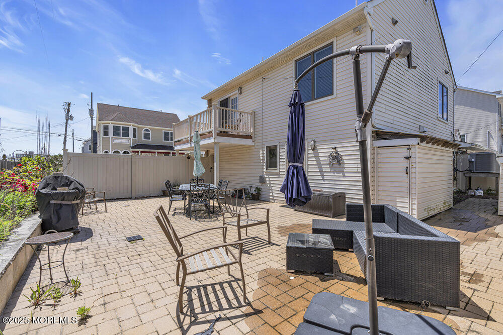2 A Holiday Road Seaside Heights, NJ 08751 - Photo 42 of 50 a view of a patio with couches and potted plants
