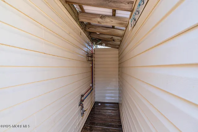 a view of roof deck with patio