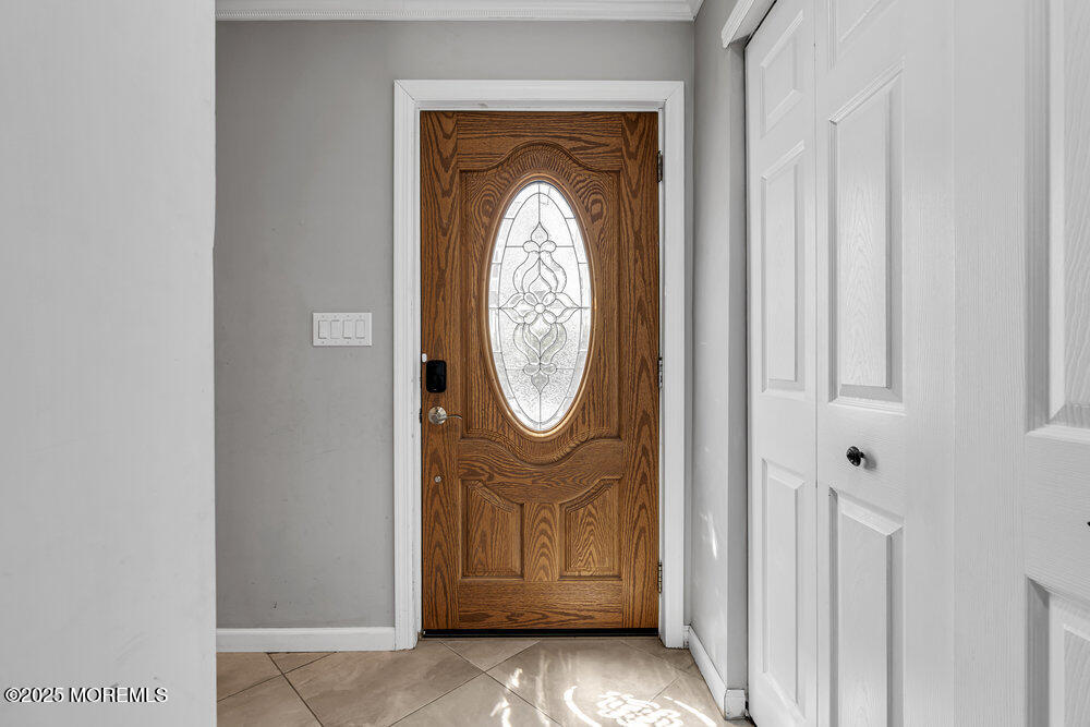 2 A Holiday Road Seaside Heights, NJ 08751 - Photo 8 of 50 a view of a livingroom with wooden floor and a white door