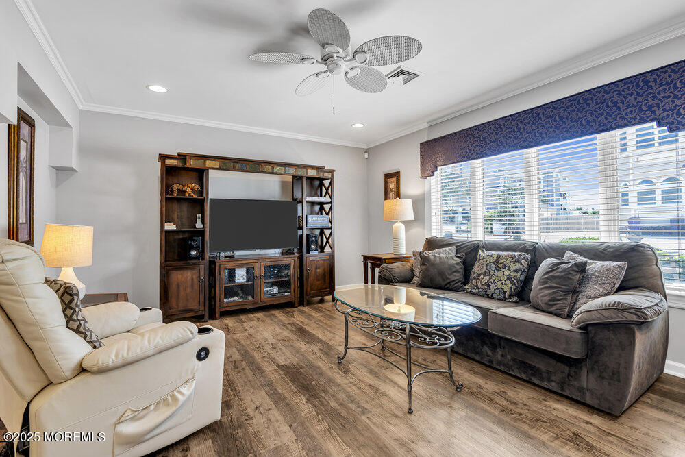 2 A Holiday Road Seaside Heights, NJ 08751 - Photo 10 of 50 a living room with furniture and a flat screen tv