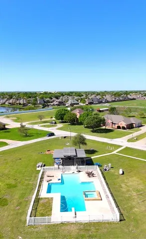 a view of a swimming pool and an ocean view