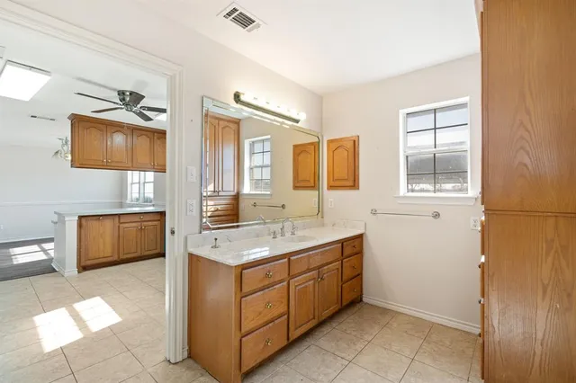 a bathroom with a sink and a toilet