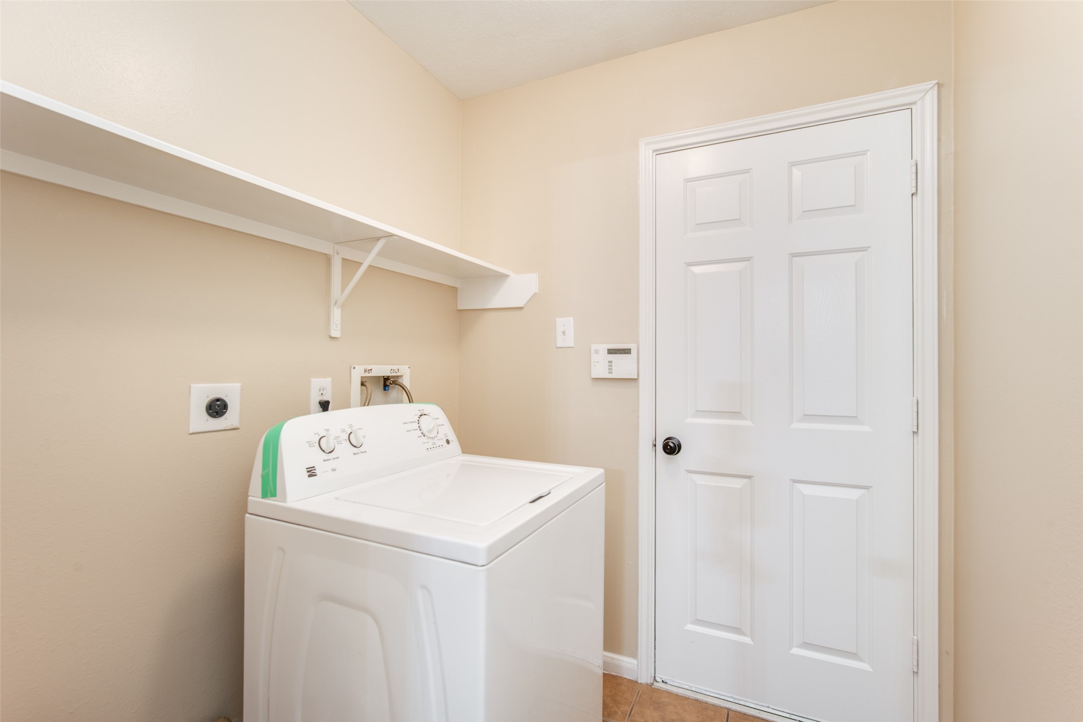 14510 Windmill Meadows Court Houston, TX 77082 - Photo 12 of 39 a utility room with dryer and washer
