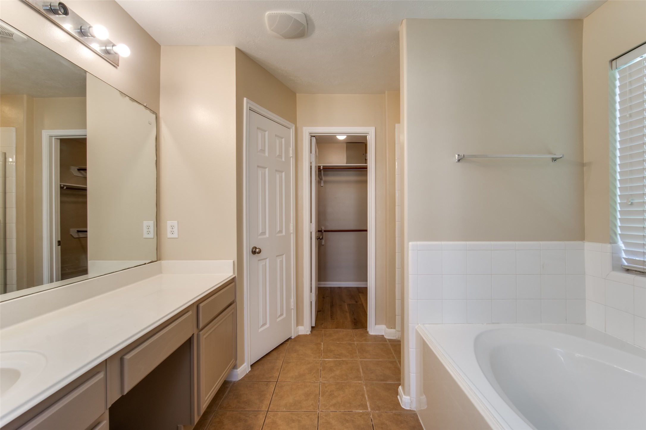 14510 Windmill Meadows Court Houston, TX 77082 - Photo 24 of 39 a bathroom with a bathtub and a shower