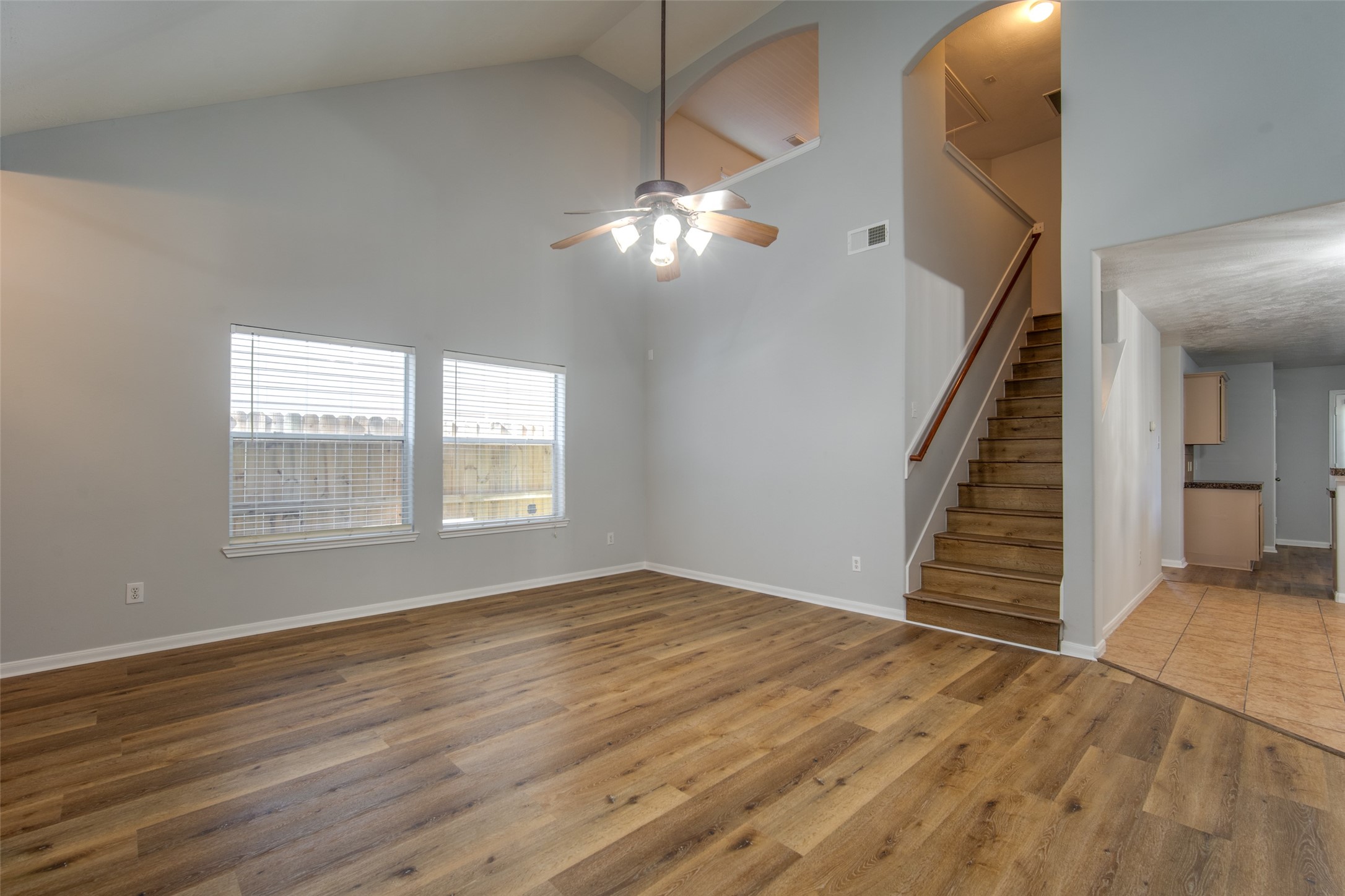 14510 Windmill Meadows Court Houston, TX 77082 - Photo 10 of 39 a view of empty room with wooden floor and fan