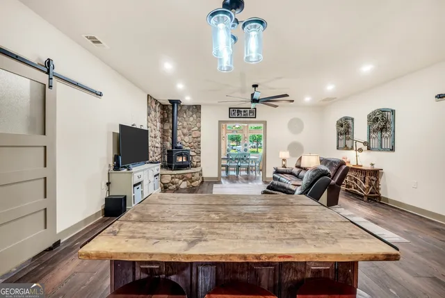 a view of a dining room with furniture window and outside view