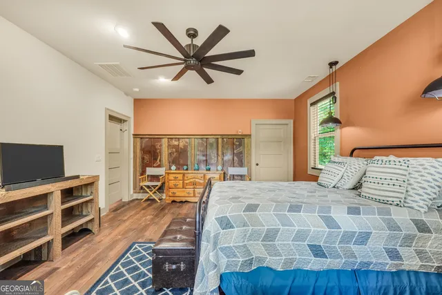 a spacious bathroom with a double vanity sink and a mirror