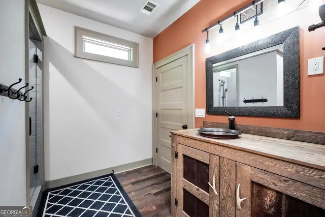 a view of a backyard with swimming pool