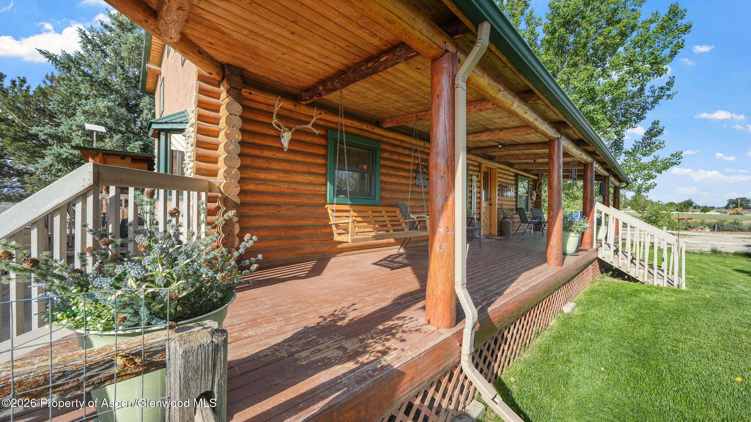 1355 N Road Loma, CO 81524 - Photo 7 of 51 a view of a porch with a backyard