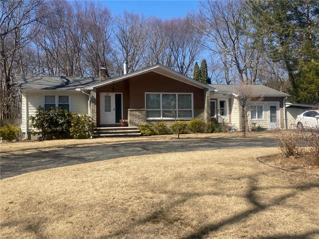 well maintained home with new roof and circle driveway and carport