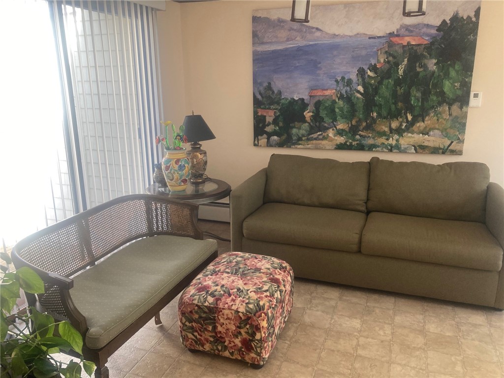 25 Oakridge Road Scituate, RI 02857 - Photo 14 of 16 breezeway has ceramic tile flooring
