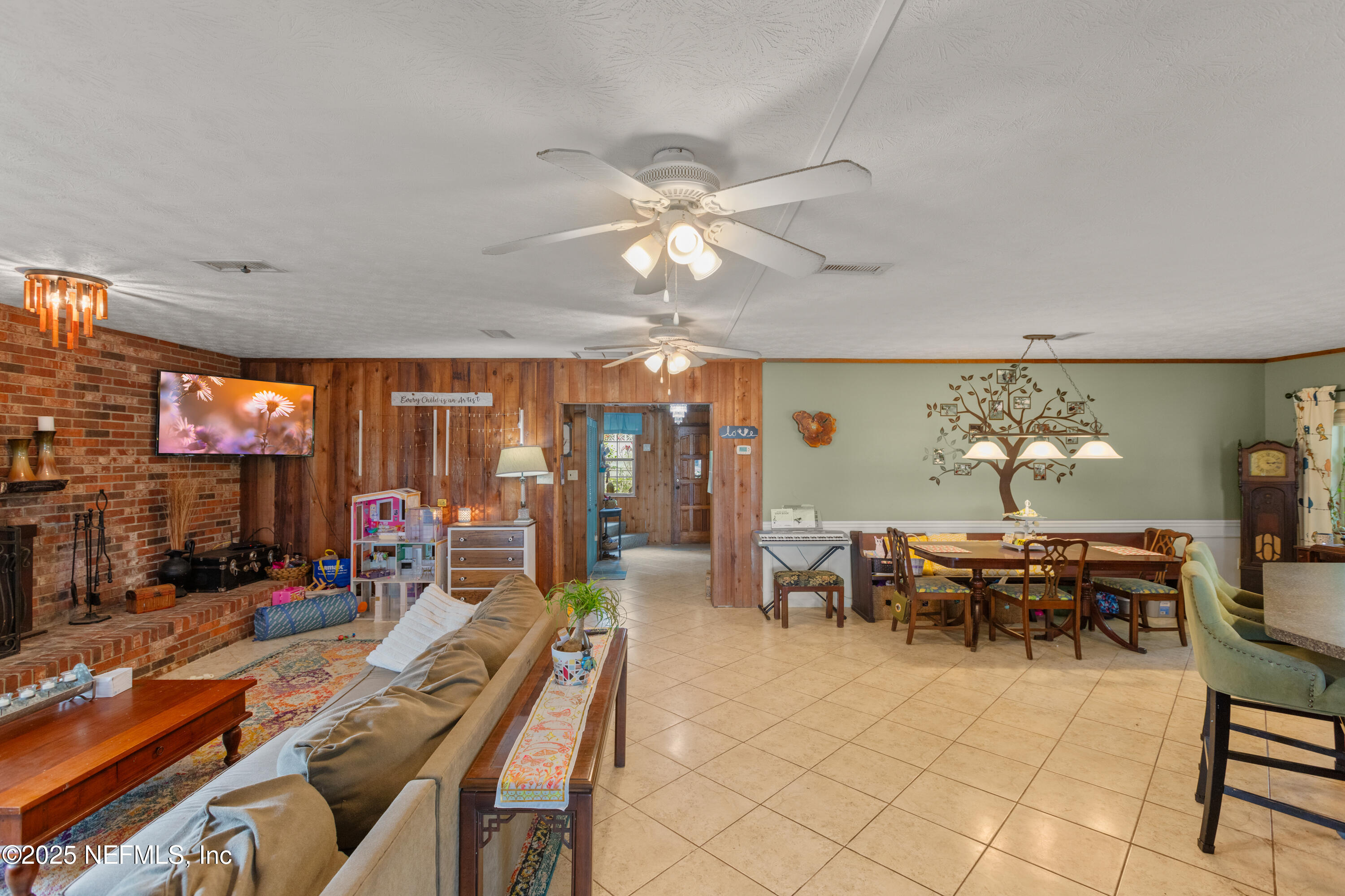 5915 White Sands Road Keystone Heights, FL 32656 - Photo 23 of 47 a view of a dining room with furniture window and outside view