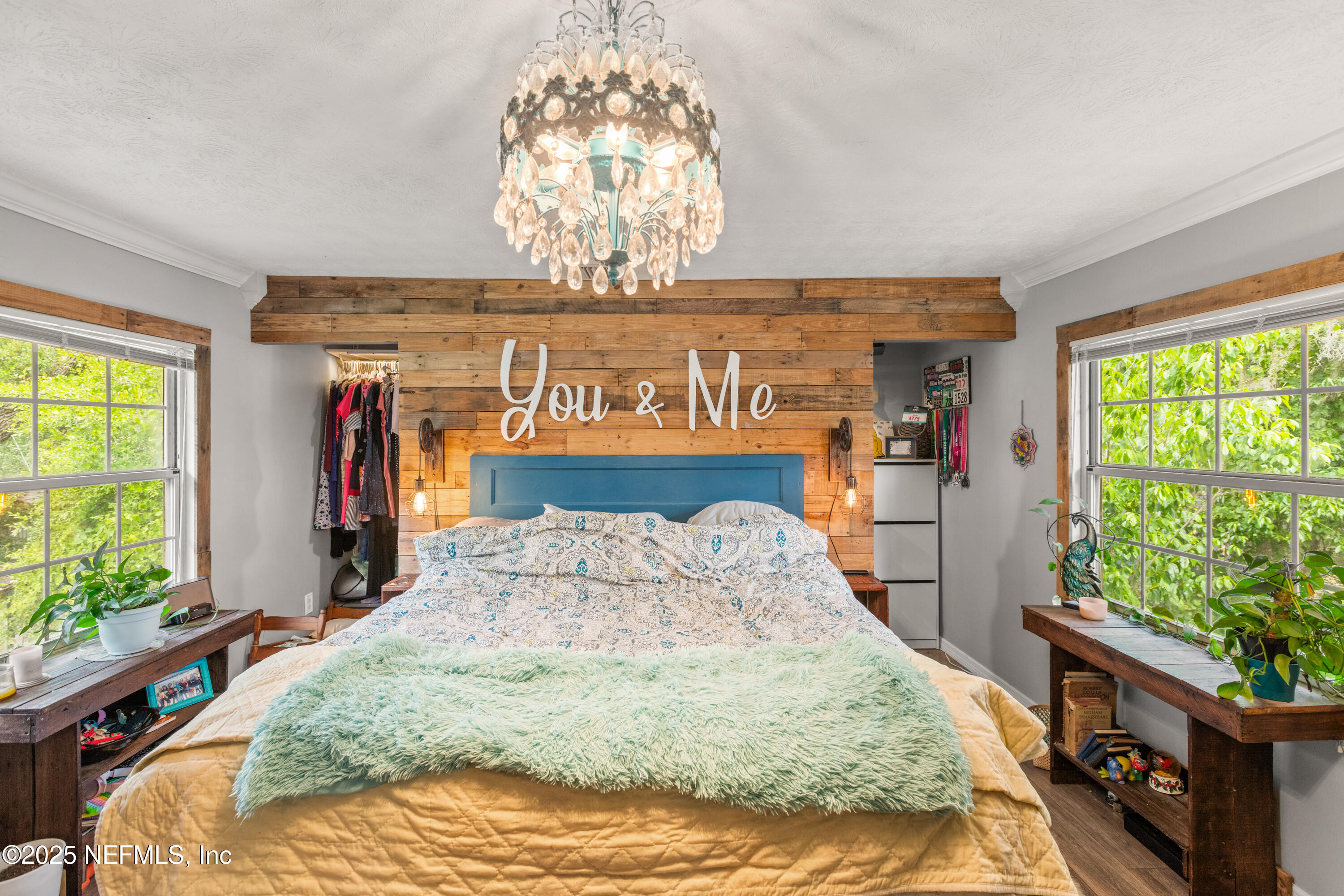 5915 White Sands Road Keystone Heights, FL 32656 - Photo 26 of 47 a bed sitting in a bedroom next to a window