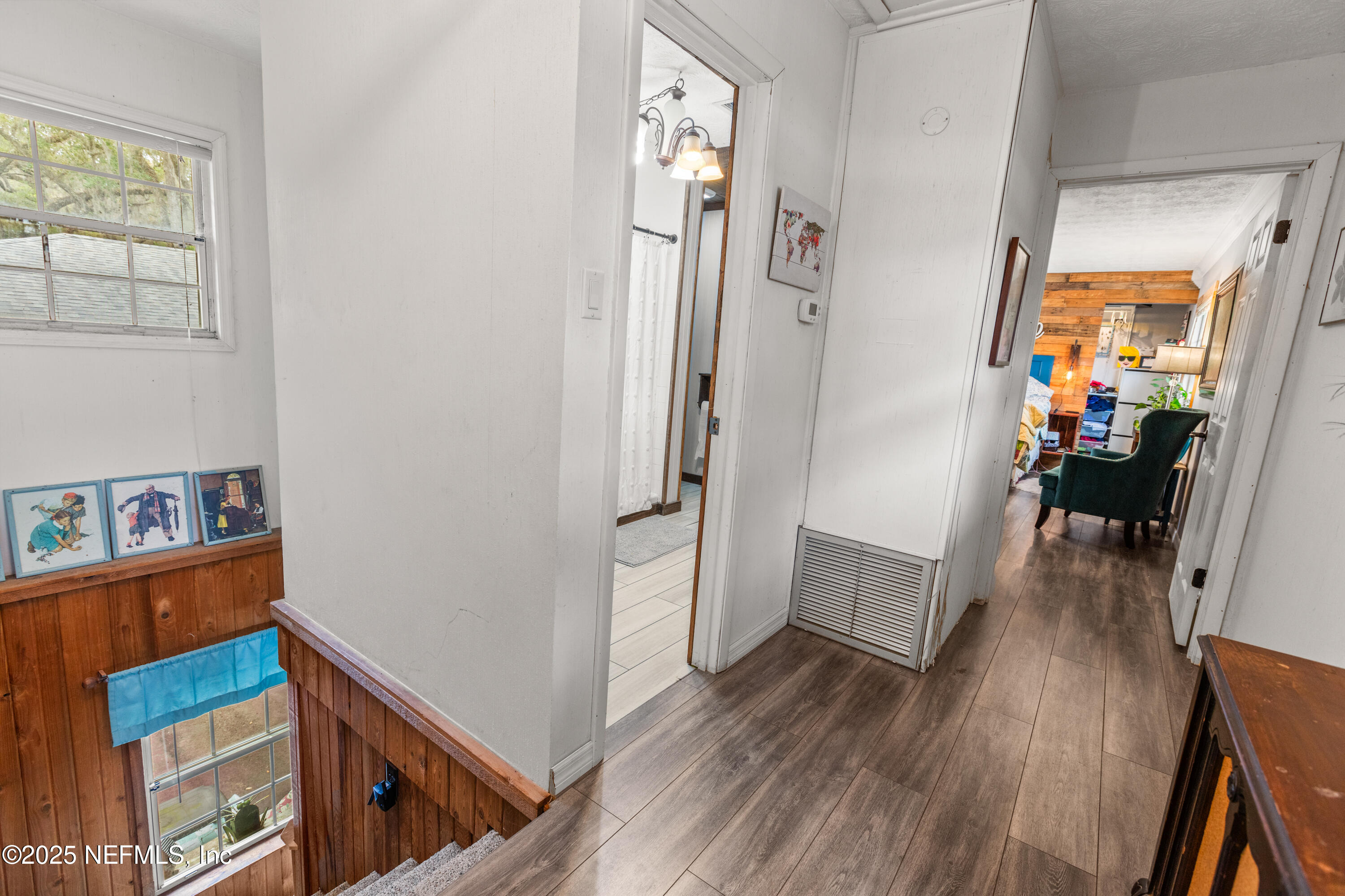 5915 White Sands Road Keystone Heights, FL 32656 - Photo 31 of 47 a view of a hallway and wooden floor an entryway