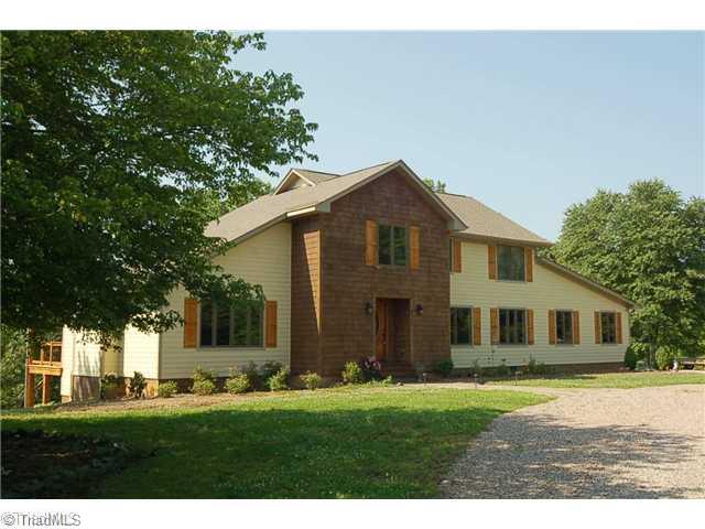 8703 Dapple Grey Road Oak Ridge, NC 27310 - Photo 1 of 16 Exterior Front.
