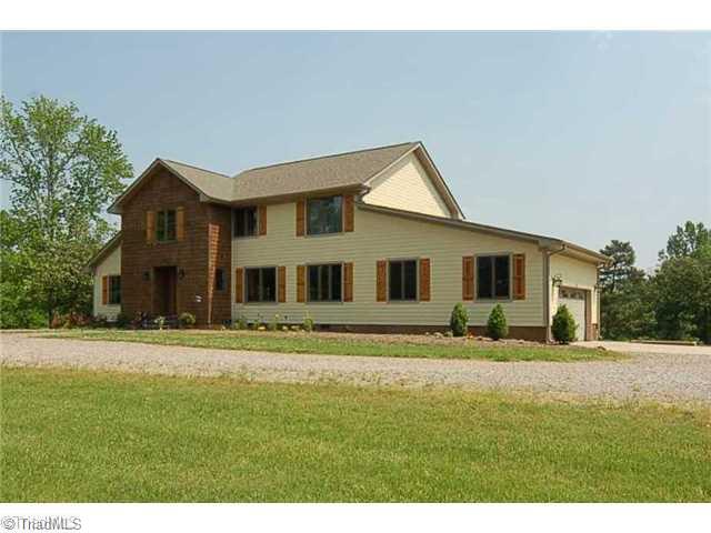 8703 Dapple Grey Road Oak Ridge, NC 27310 - Photo 2 of 16 Exterior Front.