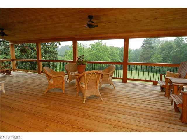 8703 Dapple Grey Road Oak Ridge, NC 27310 - Photo 3 of 16 Patio/Deck.