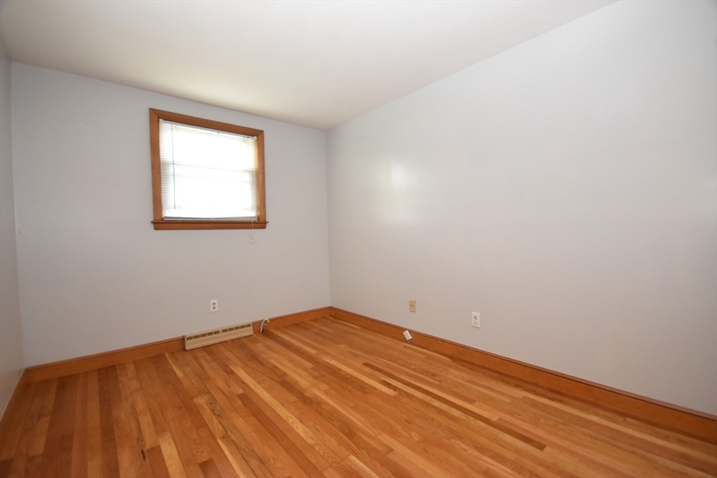 5 Brewster Road Randolph, MA 02368 - Photo 17 of 21 an empty room with a window