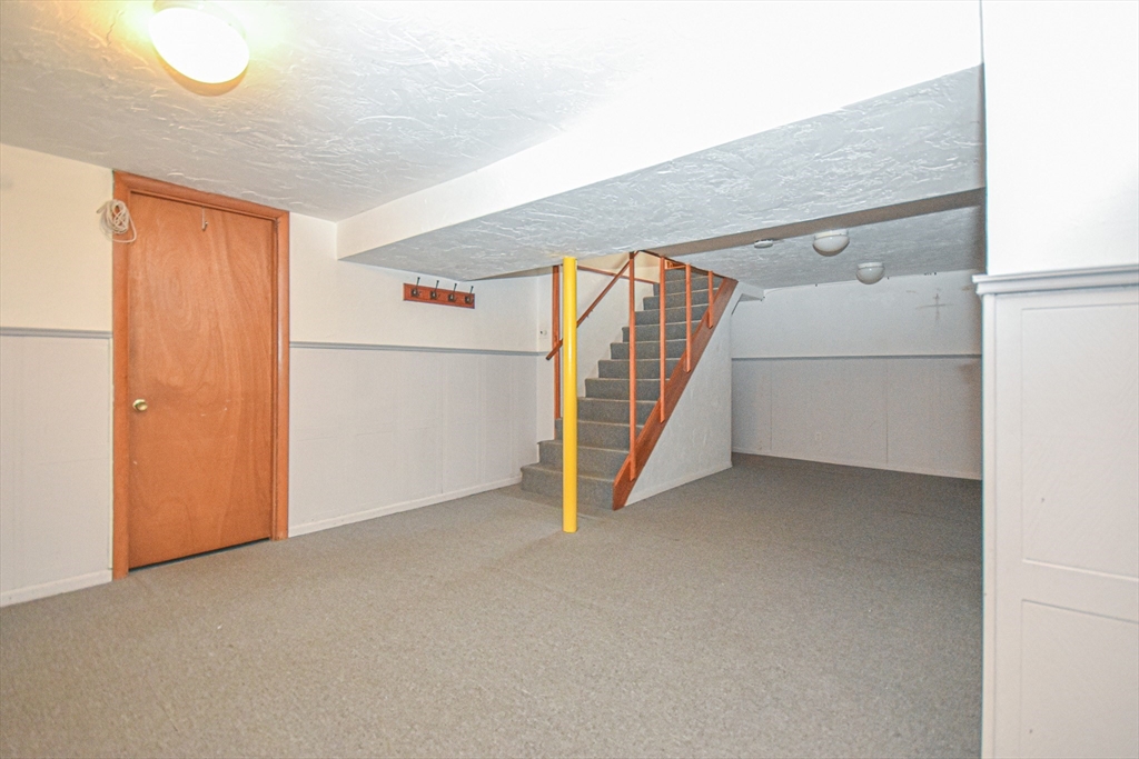 5 Brewster Road Randolph, MA 02368 - Photo 20 of 21 a view of a room with staircase