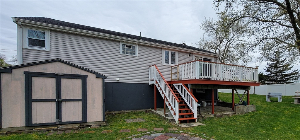 5 Brewster Road Randolph, MA 02368 - Photo 4 of 21 a front view of a house with a yard