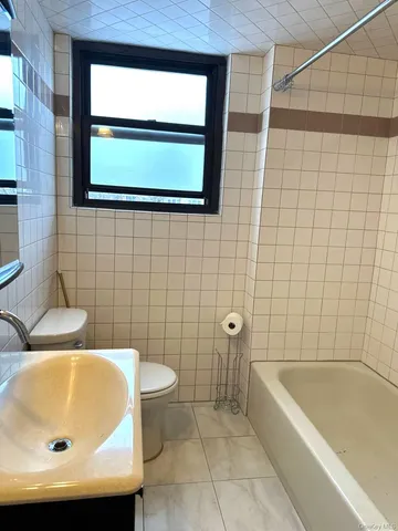 a bathroom with a sink and a bathtub