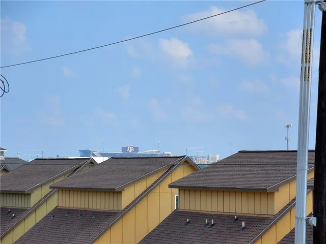 a view of a roof deck with wooden floor