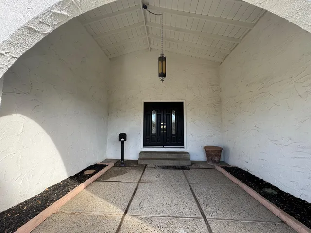 a view of a entryway of a house