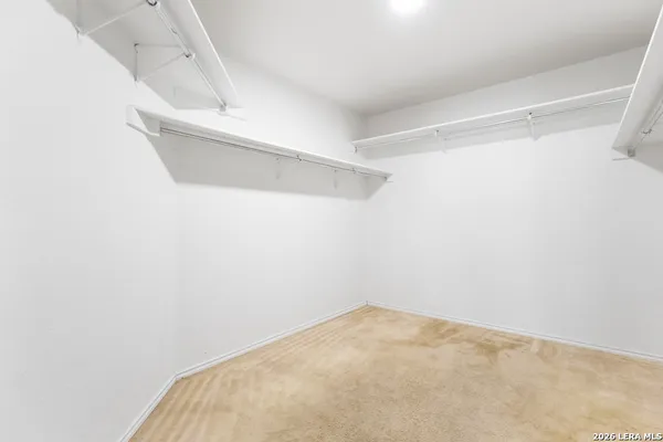 a view of a room with racks on the wall