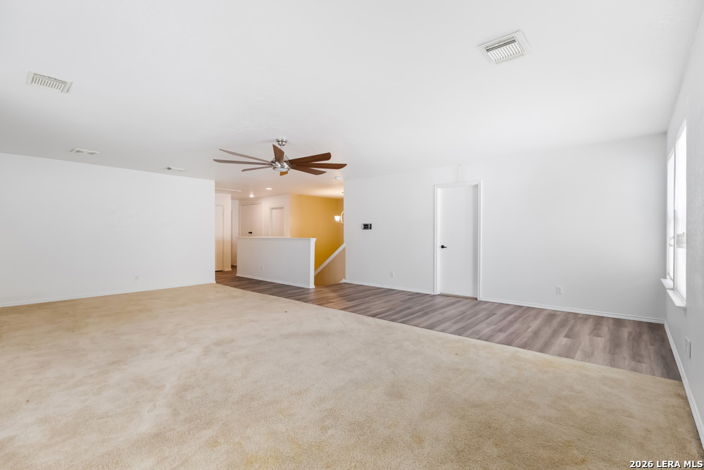 140 Springtree Parkway Cibolo, TX 78108 - Photo 17 of 25 a view of a livingroom with a fireplace