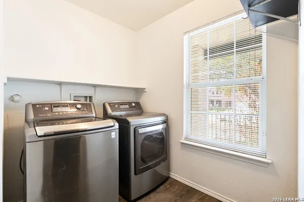 a utility room with dryer and washer