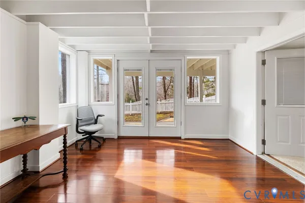 a view of entryway with wooden floor