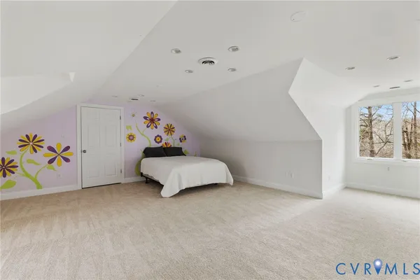 a view of empty room with windows