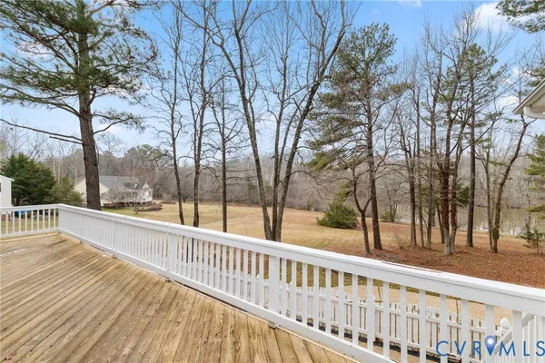 a view of a lake with a yard