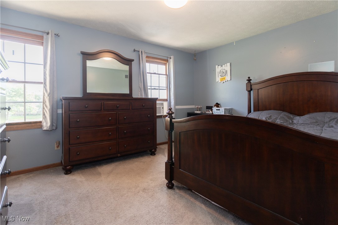 4171 Laubert Road Atwater, OH 44201 - Photo 13 of 42 Carpeted bedroom with multiple windows