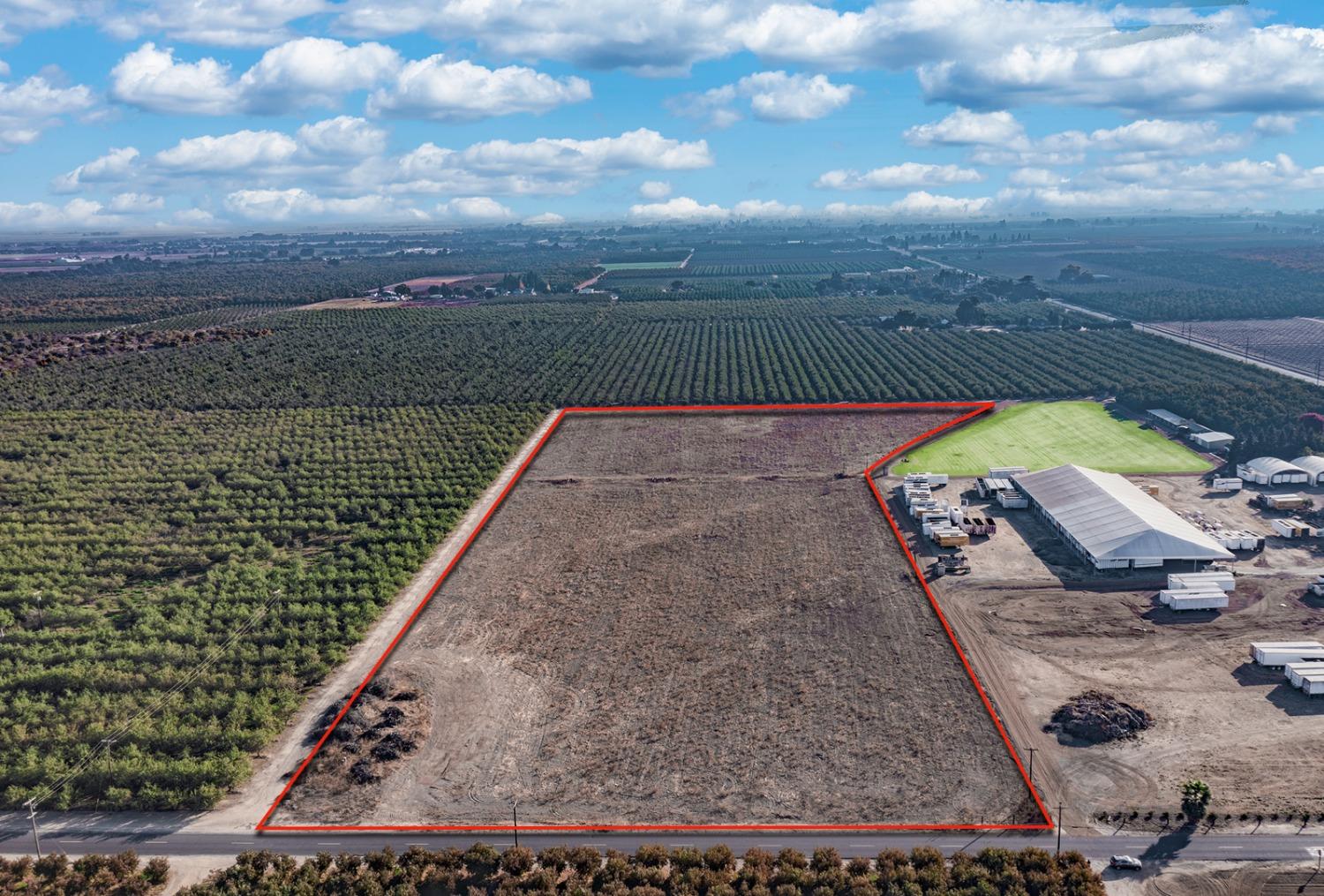 a view of a lake with a yard