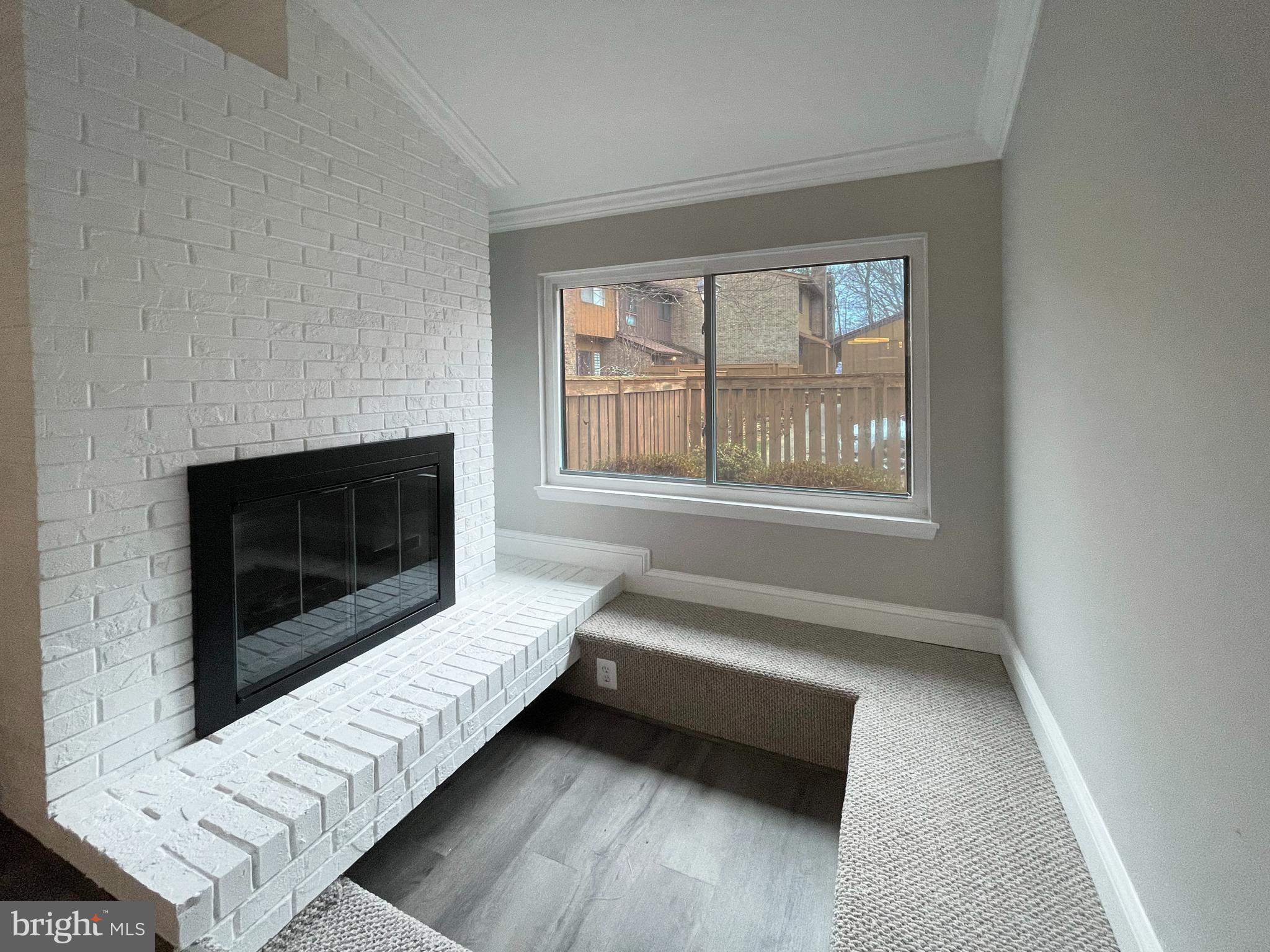 11968 Greywing Court Reston, VA 20191 - Photo 10 of 13 a living room with a couch and a fireplace