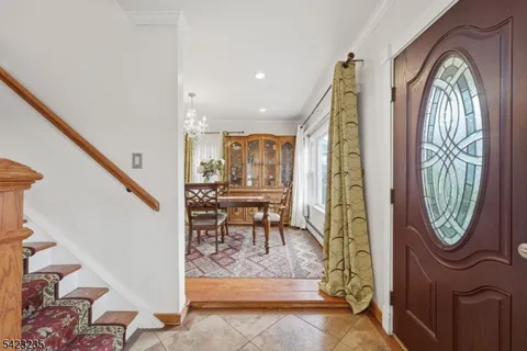 a bathroom with a granite countertop sink mirror and vanity