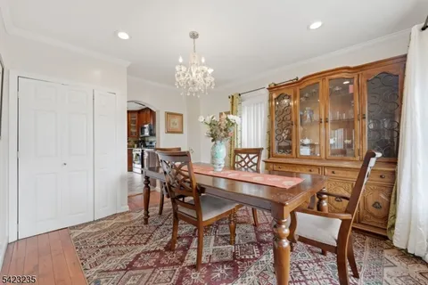 a bedroom with a bed and a chair