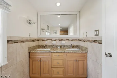 a view of a balcony with furniture