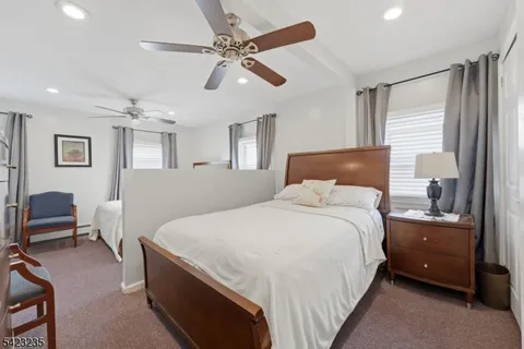 an empty room with a empty space and windows