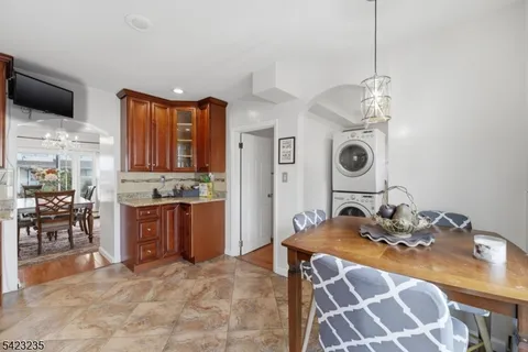 a view of a dining room with furniture and window